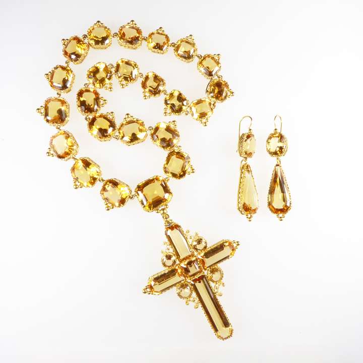 Golden topaz necklace with cross pendant-brooch and pair of pendant earrings en suite